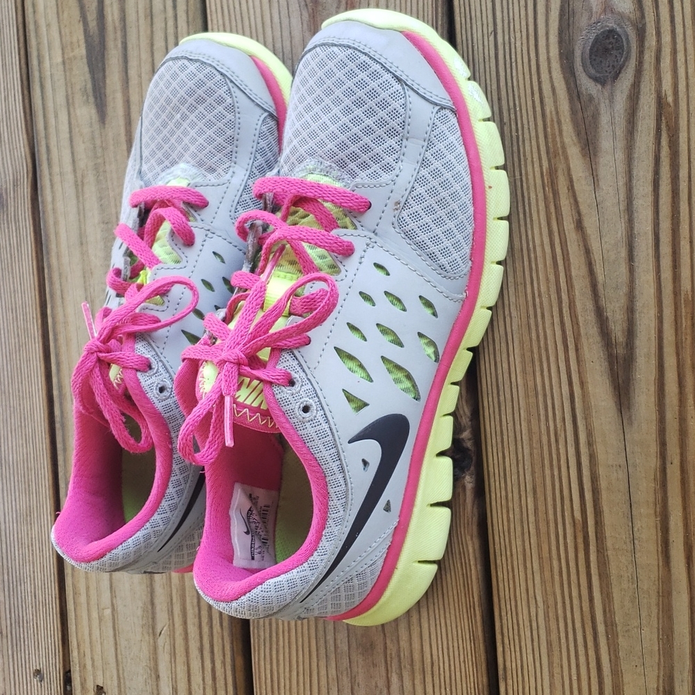 Nike Women's Light Gray Athletic Shoes with Pink and Neon Yellow Accents